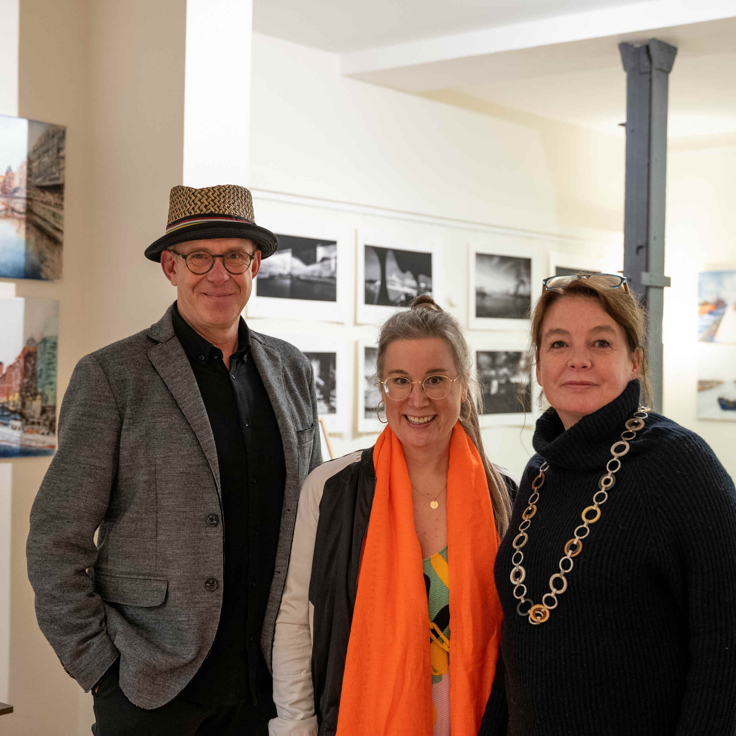 Artists Peter Schulte and Nina Groth and gallery owner Claudia Tonn at the exhibition "City Walks" in the gallery "Die kleine Galerie in Flottbek" in Hamburg